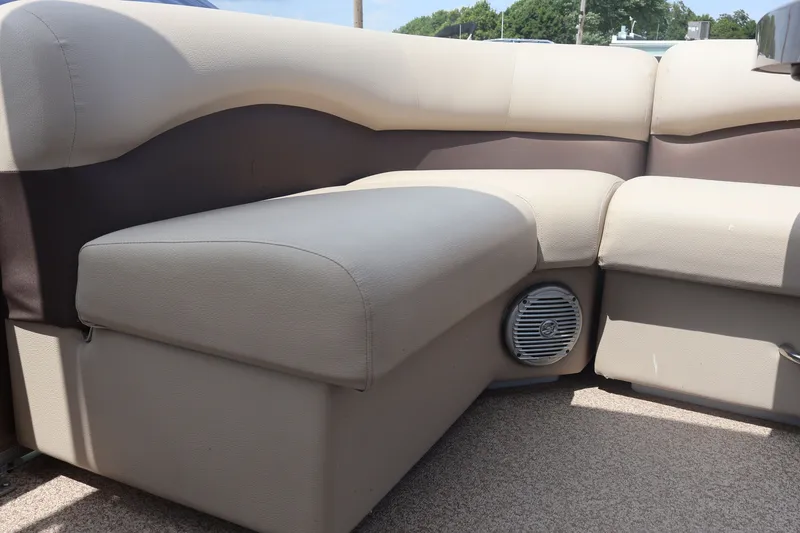 Slide: The Image of 2015 Palm Beach Ultra Sport 220 RL boat seating with built-in speaker. - 23