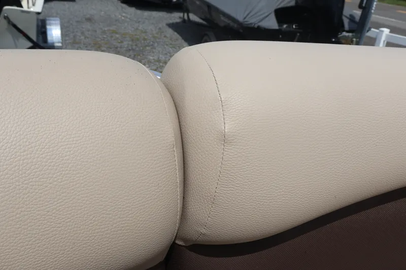 Slide: The Image of Beige leather upholstery on 2015 Palm Beach Ultra Sport 220 RL boat seat. - 16