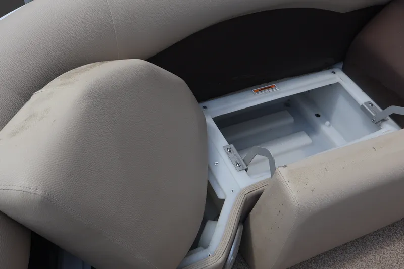 Slide: The Image of 2015 Palm Beach Ultra Sport 220 RL boat seat storage compartment, open and empty. - 13