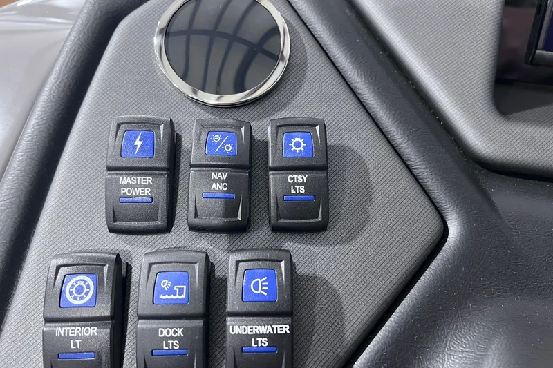 Slide: The Image of Control panel of 2026 Sylvan L3 LZ DH with various light and power switches. - 12