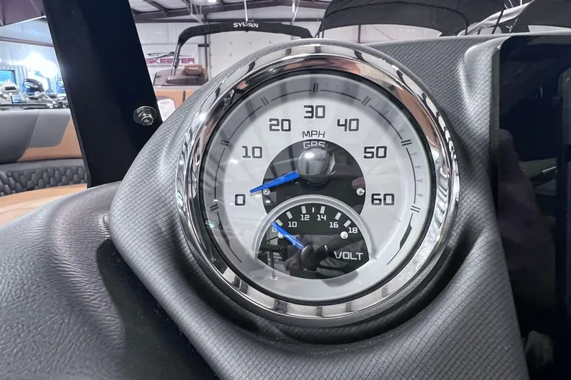 Slide: The Image of Close-up of a 2026 Sylvan L3 LZ DH speedometer and voltmeter in a boat dashboard. - 11