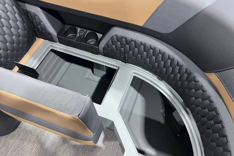 Slide: The Image of Interior of 2026 Sylvan L3 LZ DH boat with quilted seating and cup holders. - 24