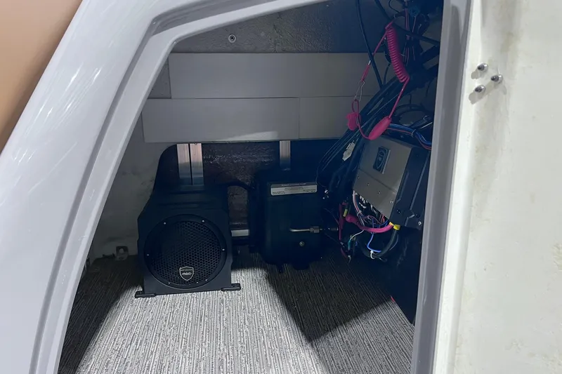 Slide: The Image of 2026 Sylvan L3 LZ DH interior compartment with audio equipment and wiring. - 27