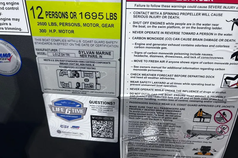 Slide: The Image of Boat capacity and safety label for Sylvan L3 LZ DH, 2026 model, 12 persons or 1695 lbs. - 16