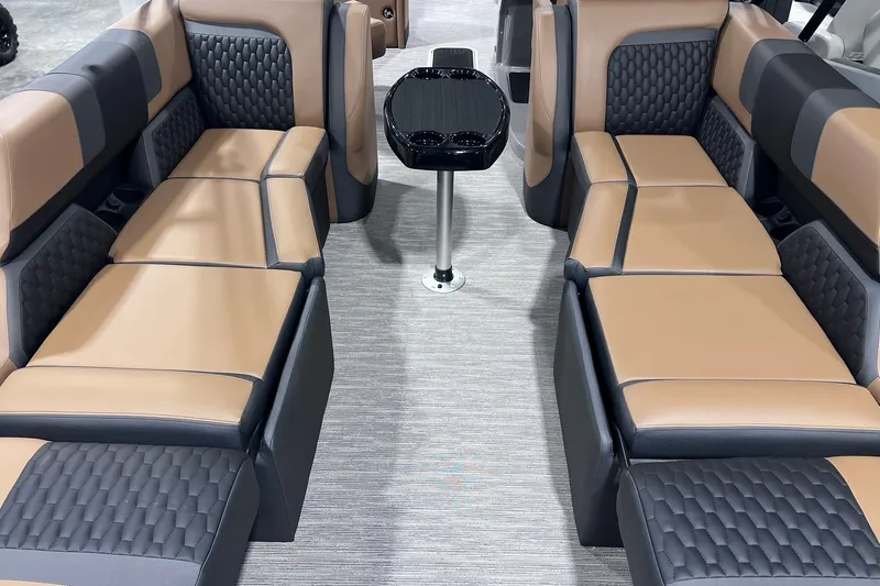 Slide: The Image of Luxurious interior of 2026 Sylvan L3 LZ DH pontoon boat with plush seating and sleek table. - 18