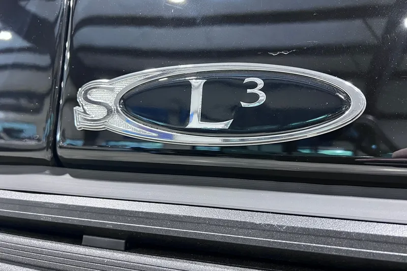 Slide: The Image of 2026 Sylvan L3 LZ DH emblem on a sleek black surface. - 30