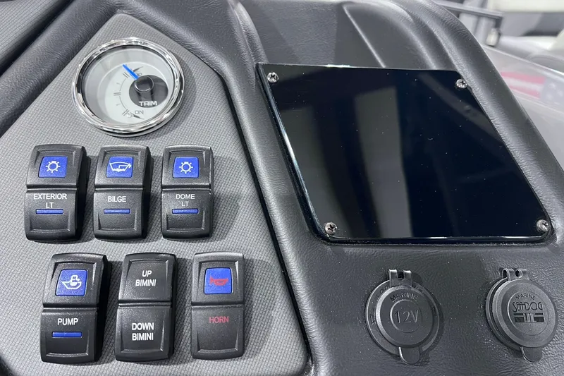 Slide: The Image of Control panel of 2026 Sylvan L3 LZ DH boat with switches and gauges. - 13