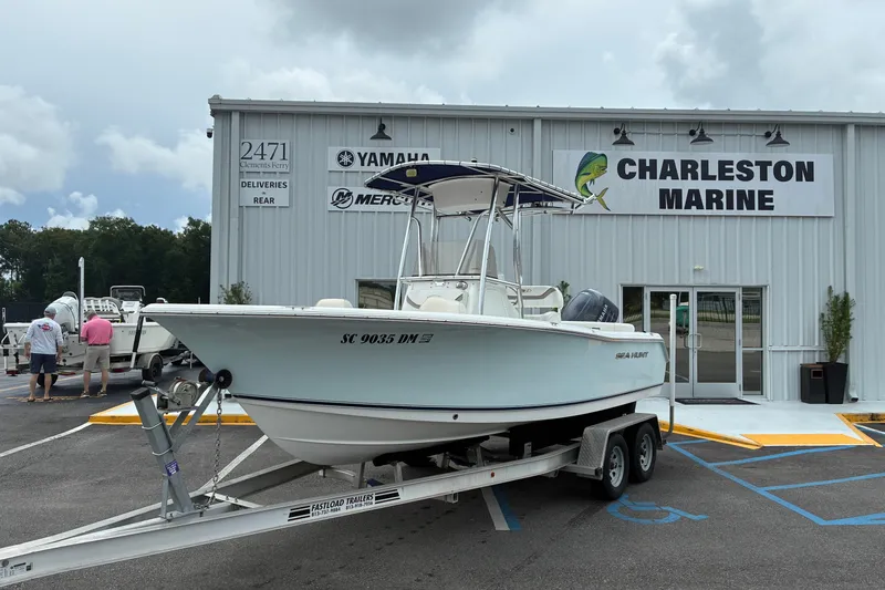 The Image of 2012 Sea Hunt Ultra 211 boat on trailer at Charleston Marine dealership. - 0
