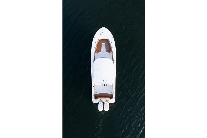 Slide: The Image of Aerial view of 2026 Sea Hunt Ultra 305SE boat on water. - 42