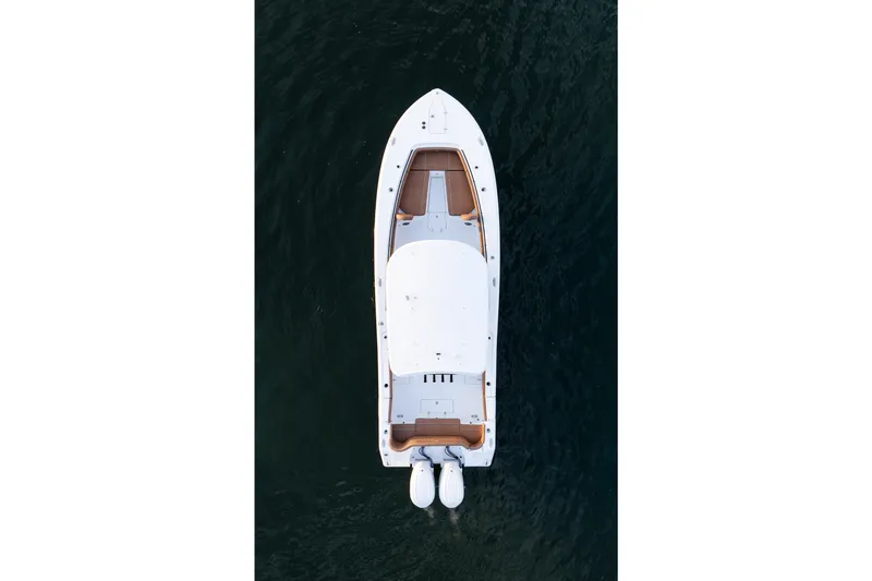 Slide: The Image of Aerial view of 2026 Sea Hunt Ultra 305SE boat on water. - 44
