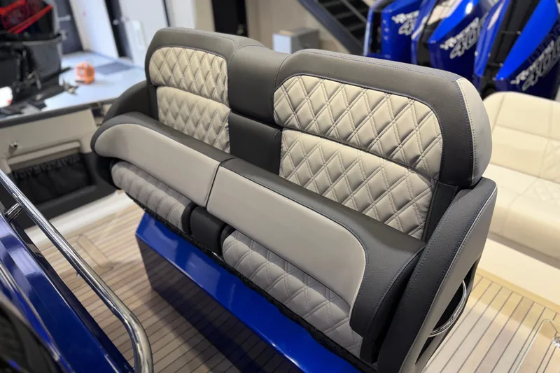Slide: The Image of Luxury seating on 2027 Nor-Tech 450 Sport boat with quilted upholstery. - 40
