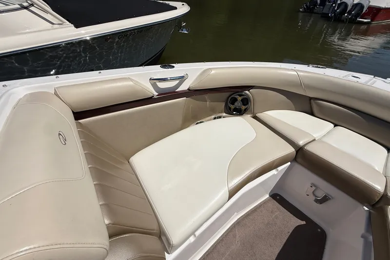 Slide: The Image of 2011 Regal 2700 ES Bowrider interior with beige seating and elegant design. - 27