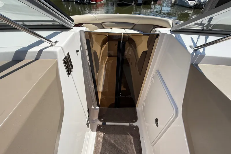 Slide: The Image of 2011 Regal 2700 ES Bowrider interior view with open cabin door. - 24