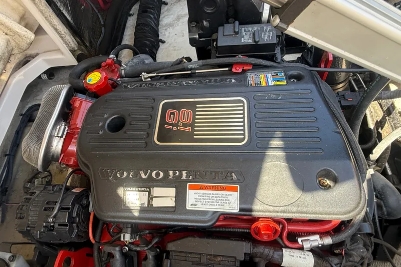 Slide: The Image of Volvo Penta 8.1 Gi engine in a 2011 Regal 2700 ES Bowrider boat. - 36