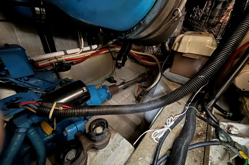 Slide: The Image of Engine room of 1988 Carver 38 Aft Cabin Motor Yacht with visible wiring and components. - 47