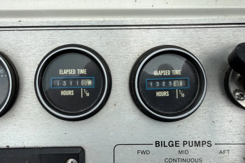 Slide: The Image of Control panel of a 1988 Carver 38 Aft Cabin Motor Yacht, showing elapsed time gauges. - 15