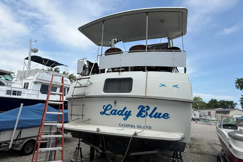 Slide: The Image of 1988 Carver 38 Aft Cabin Motor Yacht "Lady Blue" docked at Catawba Island. - 2