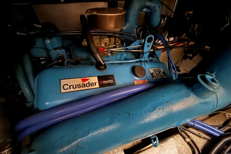 Slide: The Image of Engine of 1988 Carver 38 Aft Cabin Motor Yacht, featuring Crusader marine engine. - 44
