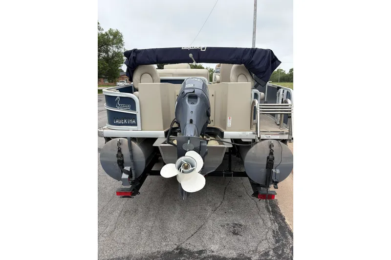 Slide: The Image of Rear view of a 2017 Premier 200 Explorer pontoon boat with motor and ladder. - 3