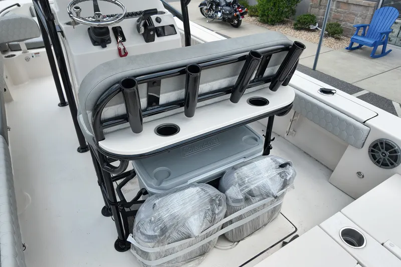 Slide: The Image of 2027 Carolina Skiff 22 Ultra Elite boat interior with rod holders and seating. - 15