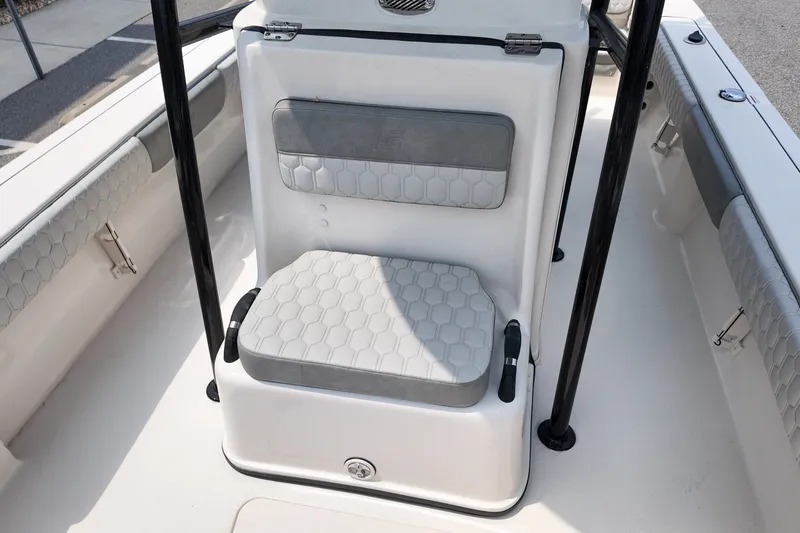 Slide: The Image of 2027 Carolina Skiff 22 Ultra Elite boat seating with hexagonal pattern upholstery. - 10