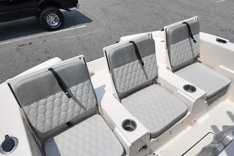 Slide: The Image of Three cushioned seats on a 2027 Carolina Skiff 22 Ultra Elite boat. - 7