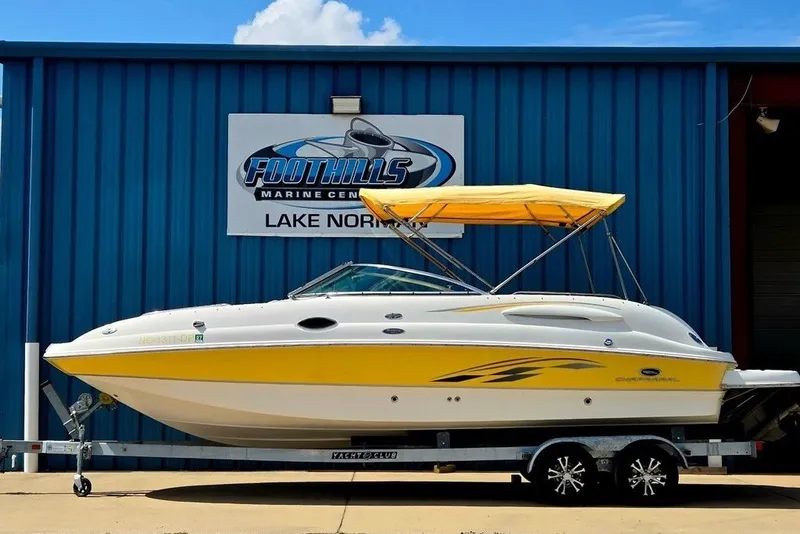 The Image of 2005 Chaparral Sunesta 254 boat with yellow accents at Foothills Marine Center. - 1