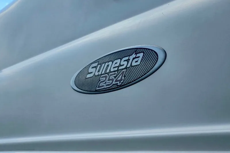 Slide: The Image of 2005 Chaparral Sunesta 254 logo on boat exterior. - 11