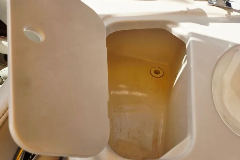 Slide: The Image of Storage compartment on a 2005 Chaparral Sunesta 254 boat. - 2