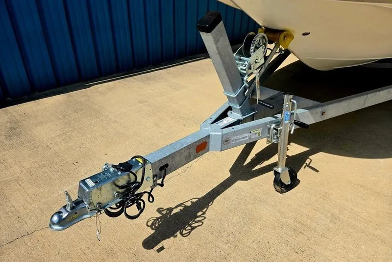 Slide: The Image of Trailer hitch of a 2005 Chaparral Sunesta 254 boat on concrete surface. - 4