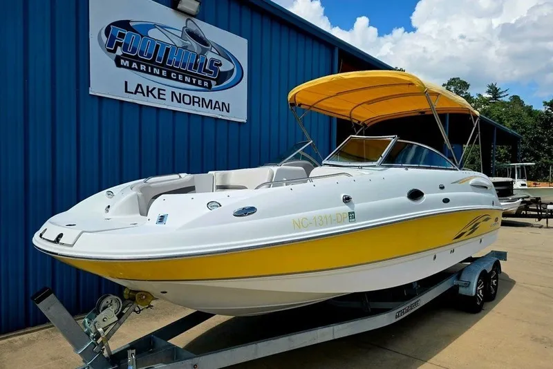 Slide: The Image of 2005 Chaparral Sunesta 254 boat with yellow canopy at Foothills Marine Center, Lake Norman. - 33