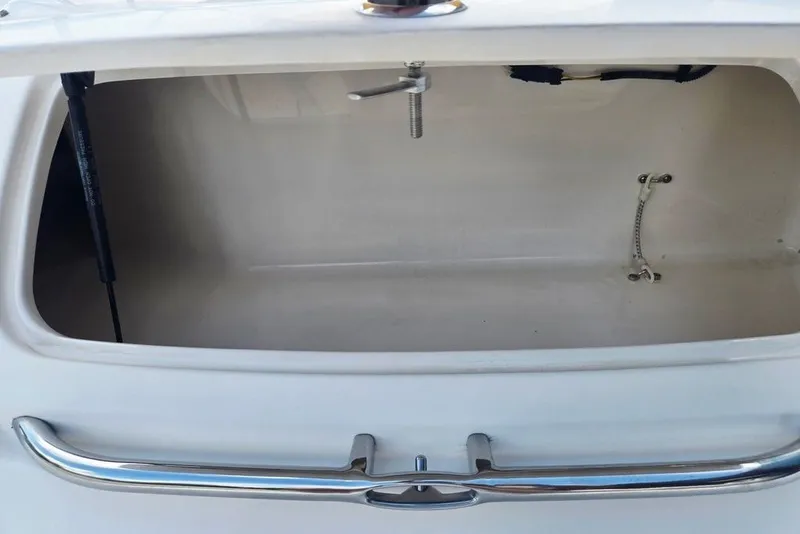 Slide: The Image of Open storage compartment of 2005 Chaparral Sunesta 254 boat. - 12