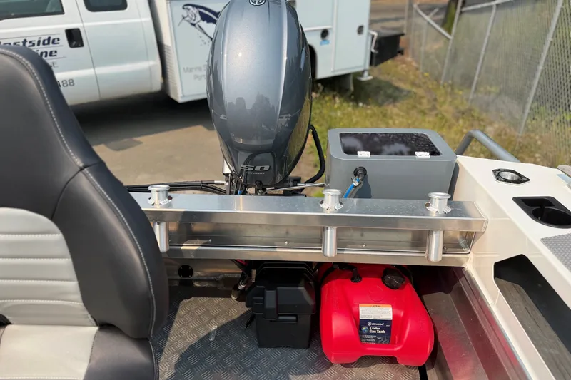 Slide: The Image of 2025 Stabicraft 1450 Explorer boat interior with motor and fuel tank. - 6