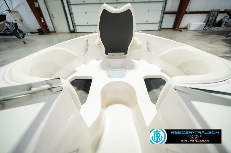 Slide: The Image of 2006 Starcraft C-Star 1700 I/O F&S boat interior with seating and storage compartments. - 30