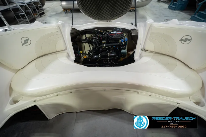 Slide: The Image of 2006 Starcraft C-Star 1700 I/O F&S boat engine compartment with seating area. - 25