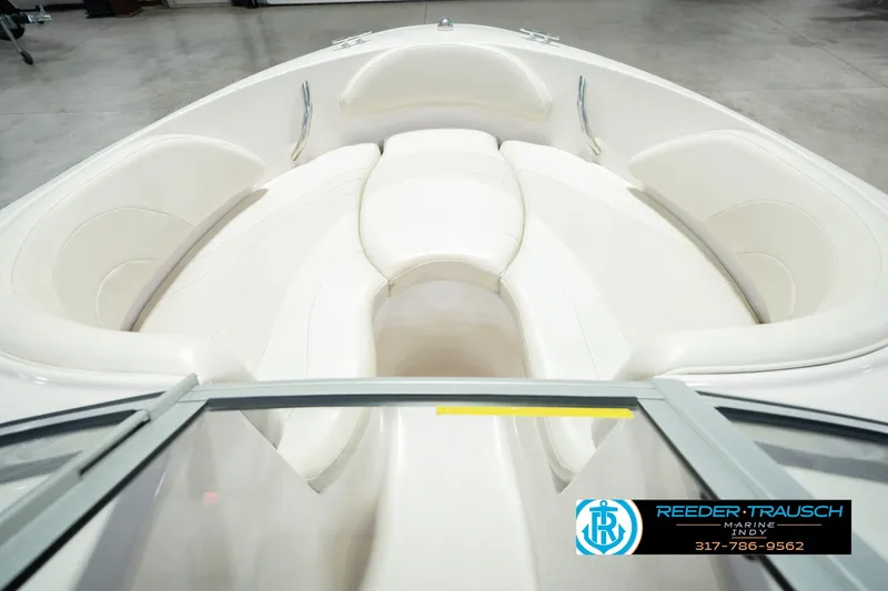 Slide: The Image of 2006 Starcraft C-Star 1700 I/O F&S boat interior with white seating and sleek design. - 20