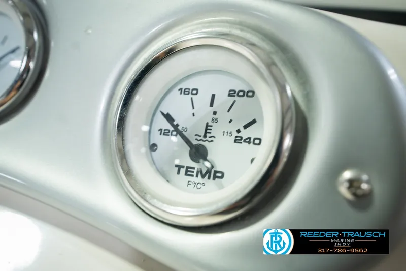 Slide: The Image of Close-up of a temperature gauge on a 2006 Starcraft C-Star 1700 I/O F&S boat. - 40