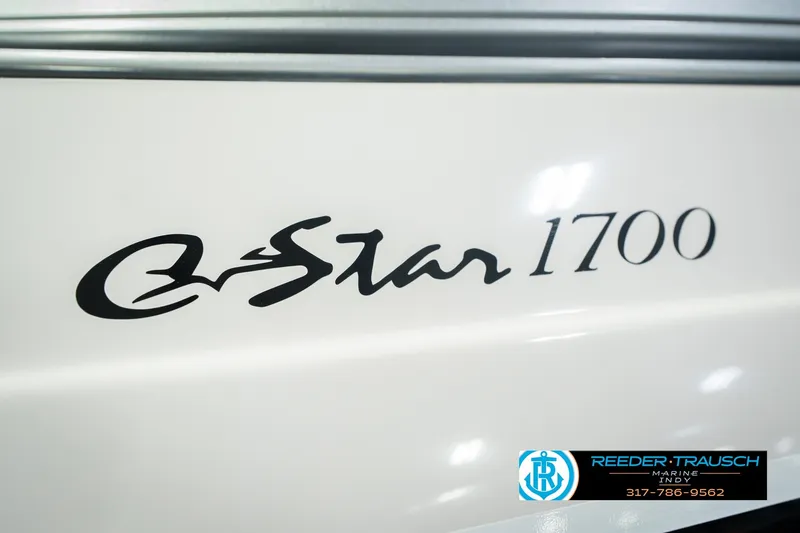 Slide: The Image of 2006 Starcraft C-Star 1700 I/O F&S boat logo with dealership contact information. - 53