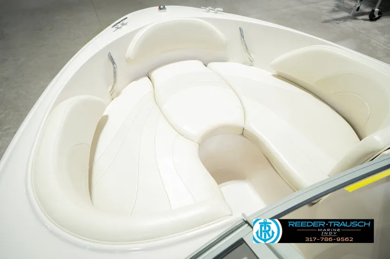 Slide: The Image of 2006 Starcraft C-Star 1700 I/O F&S boat interior with white cushioned seating. - 44