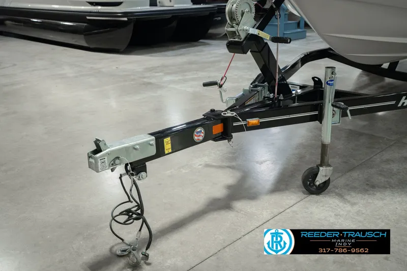 Slide: The Image of Trailer hitch of a 2006 Starcraft C-Star 1700 I/O F&S boat in a showroom. - 54