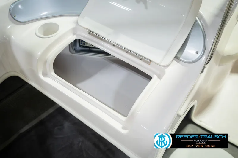 Slide: The Image of Open storage compartment on 2006 Starcraft C-Star 1700 I/O F&S boat. - 28