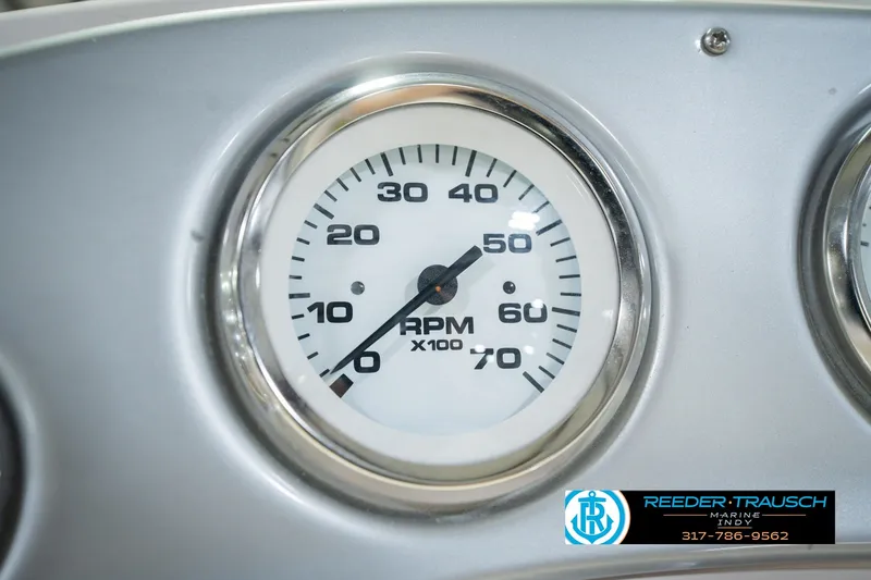 Slide: The Image of Close-up of a 2006 Starcraft C-Star 1700 I/O F&S RPM gauge. - 36
