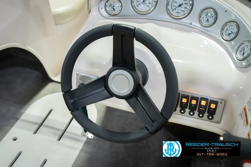 Slide: The Image of Steering wheel and dashboard of 2006 Starcraft C-Star 1700 I/O F&S boat. - 32