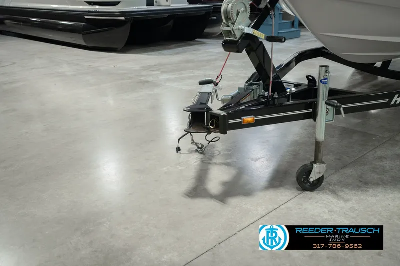 Slide: The Image of Trailer hitch of a 2006 Starcraft C-Star 1700 I/O F&S boat in a showroom. - 55