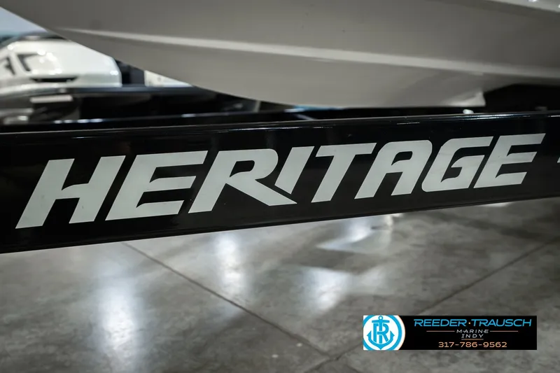 Slide: The Image of Trailer with "HERITAGE" branding for 2006 Starcraft C-Star 1700 I/O F&S boat. - 56