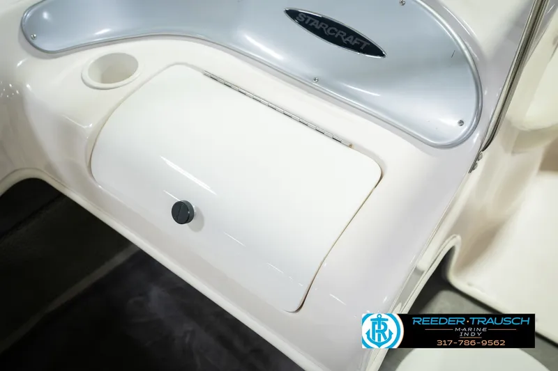 Slide: The Image of 2006 Starcraft C-Star 1700 I/O F&S boat interior detail with storage compartment. - 26