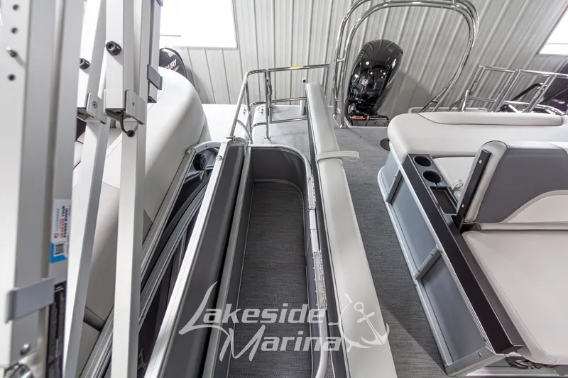 Slide: The Image of 2026 Godfrey Monaco 235 SFLC interior with seating and storage, showcased at Lakeside Marina. - 21