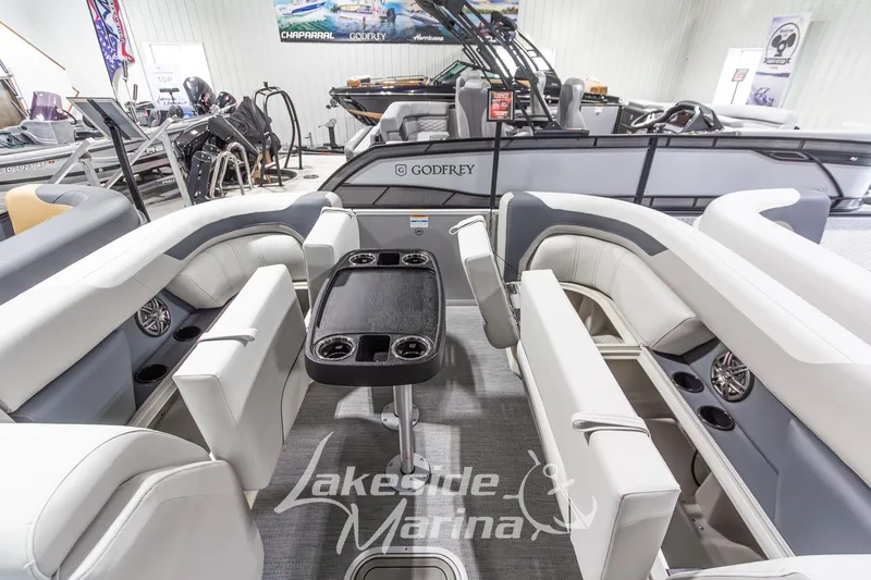 Slide: The Image of Interior of 2026 Godfrey Monaco 235 SFLC pontoon boat at Lakeside Marina showroom. - 6