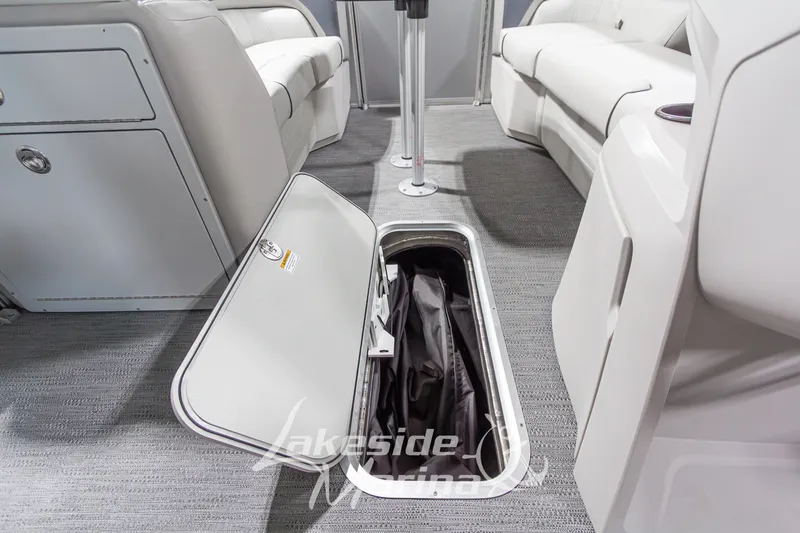 Slide: The Image of Open storage compartment in 2026 Godfrey Monaco 235 SFLC boat interior. - 8
