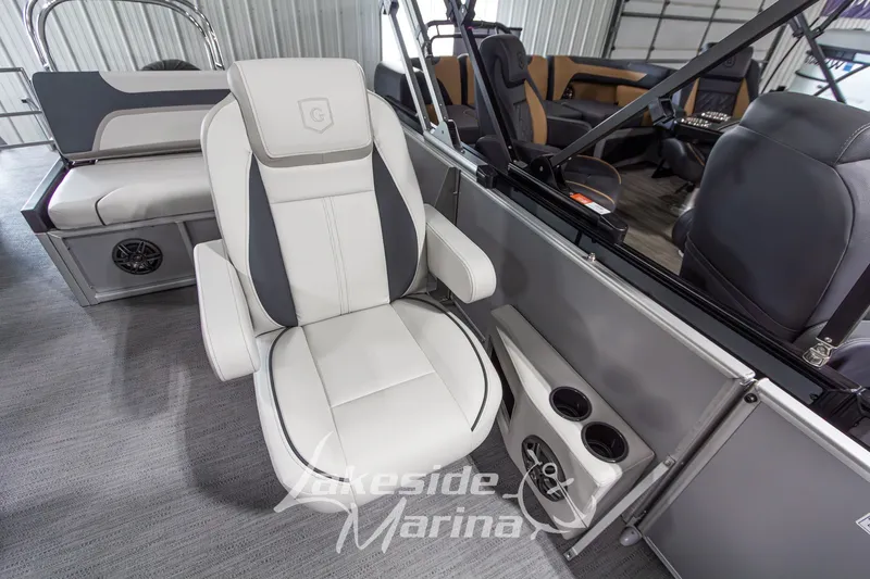 Slide: The Image of Luxury seating on 2026 Godfrey Monaco 235 SFLC pontoon boat at Lakeside Marina. - 11